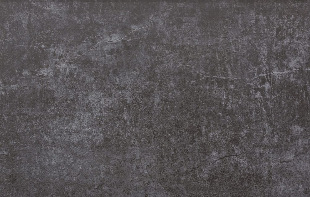 Dark gray concrete texture with fine cracks and a rough surface